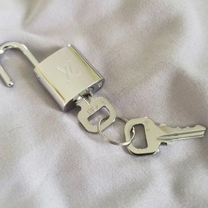 Louis Vuitton Silver lock and key with necklace chain